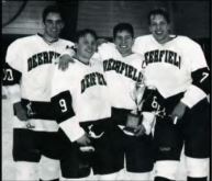 Drew Reid, Tye Korbl, Ty Hennes and Chris Dirkes (left to right) celebrate after winning the 1997 Flood Marr Christmas Tournament.